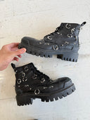 BALENCIAGA PIERCING ‘STRIKE’ BOOTS