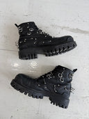 BALENCIAGA PIERCED STRIKE BOOTS