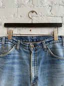 CHROME HEARTS ORANGE TAB LEVIS WITH BLACK PATCHES