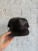 CHROME HEARTS LEATHER ‘CEMETERY’ TRUCKER HAT