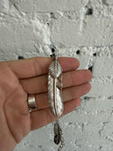 GOROS MULTI FEATHER/ARROWHEAD/CLAW NECKLACE WITH EAGLE/WHEEL CLASP