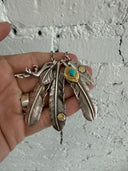 GOROS MULTI FEATHER/ARROWHEAD/CLAW NECKLACE WITH EAGLE/WHEEL CLASP