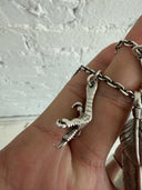 GOROS MULTI FEATHER/ARROWHEAD/CLAW NECKLACE WITH EAGLE/WHEEL CLASP