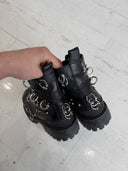 BALENCIAGA PIERCED STRIKE BOOTS