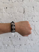 CHROME HEARTS ‘ROLLING STONES’ LEATHER SNAP BRACELET